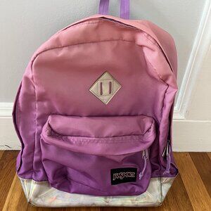 Jansport backpack: purple “iridescent suns”